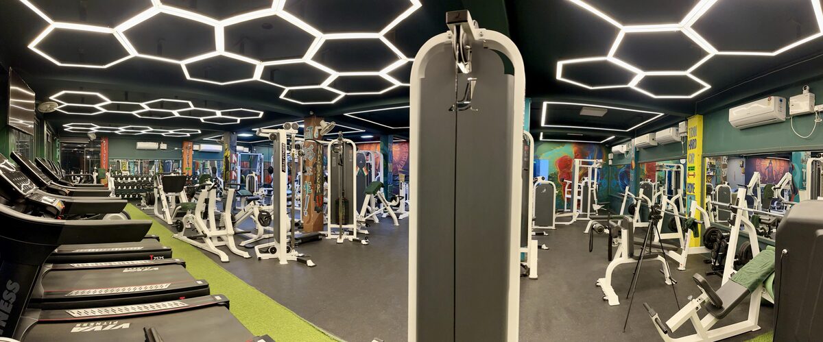 Hulk Fitness premium gym interior with JERAI equipment and atmospheric lighting